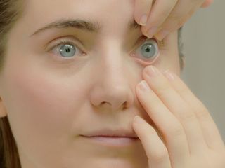2. Gently pull down your lower eyelid